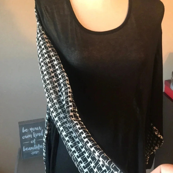 Cool black and white long sleeves top. From - Picture 2 of 7